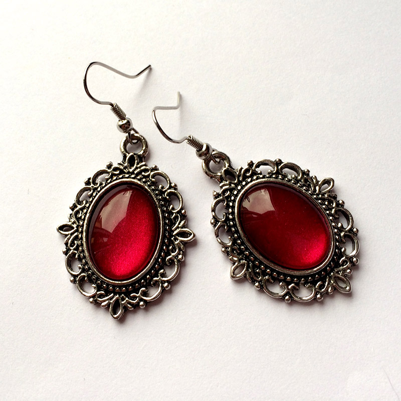 red dangle earrings
